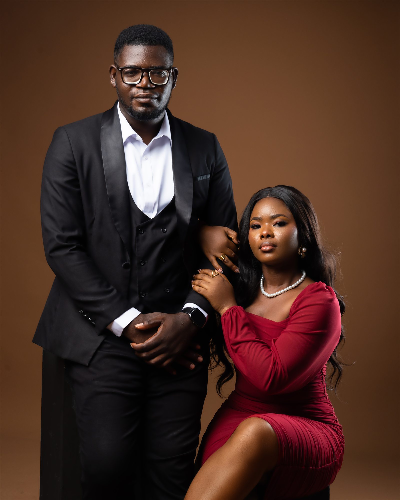 Benard and Phidelia in a formal studio portrait.